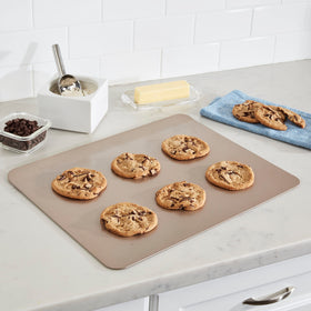 Cuisinart Chef's Classic 17-inch cookie sheet side view highlighting nonstick release and easy cleanup.