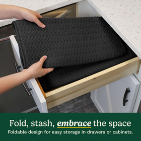 Foldable Cuisinart dish drying mat stored compactly after use.