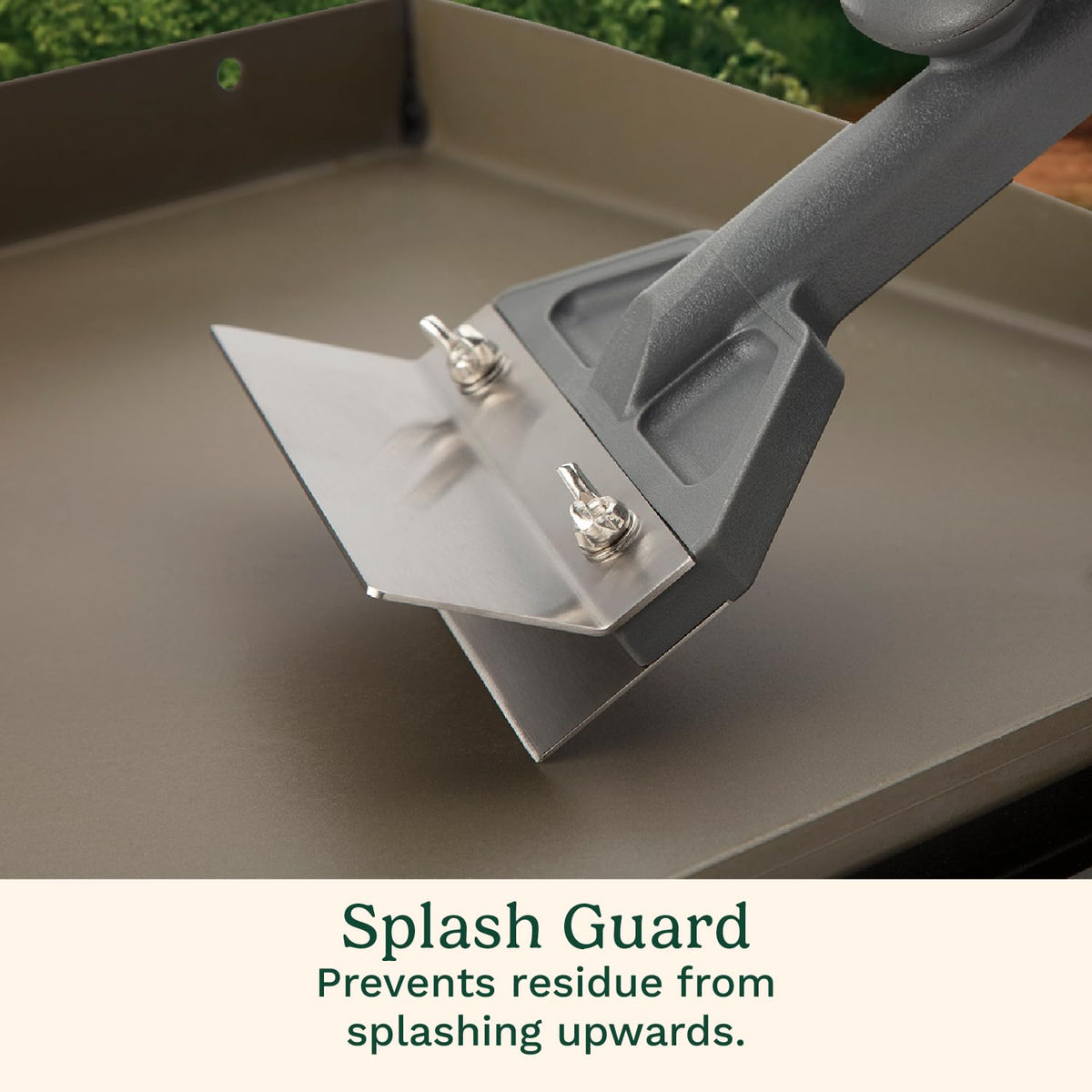 Cuisinart heavy-duty griddle scraper showing top knob grip for enhanced leverage.