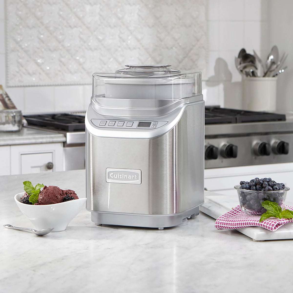 Cuisinart ice cream maker lid with ingredient spout for mess-free pouring.