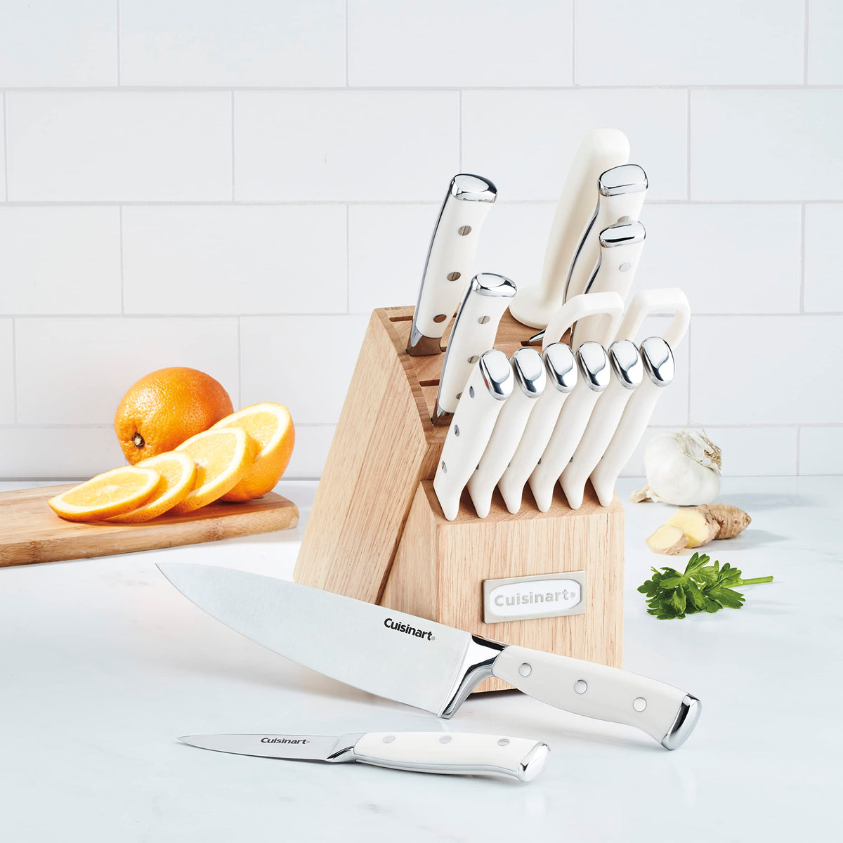 Cuisinart knife block with riveted full-tang knives in natural wood.