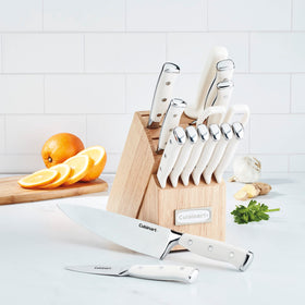 Cuisinart knife block with riveted full-tang knives in natural wood.