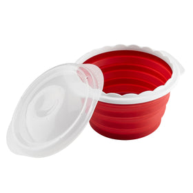 Compact silicone bowl collapsed for easy storage.