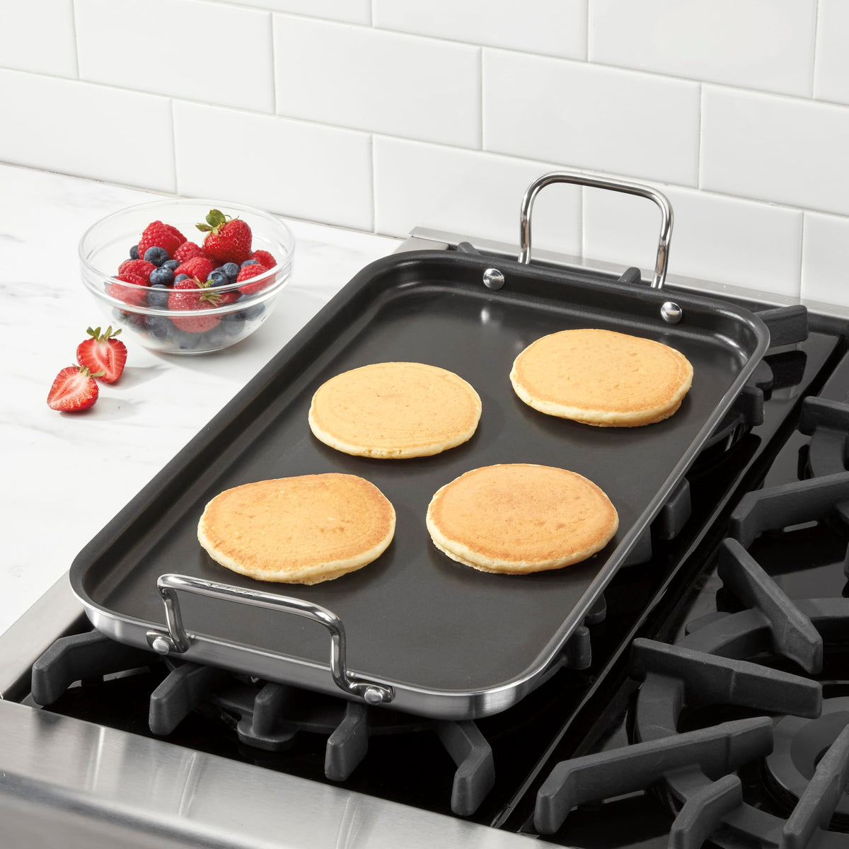 Cuisinart MultiClad Pro griddle side view highlighting heat distribution for uniform browning.