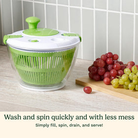 Cuisinart salad spinner water drain opening enabling effortless rinsing without lid removal.