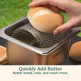 Buns toasting with Cuisinart butter wheel on a griddle