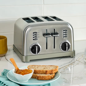 Cuisinart toaster with defrost and reheat controls for frozen breads