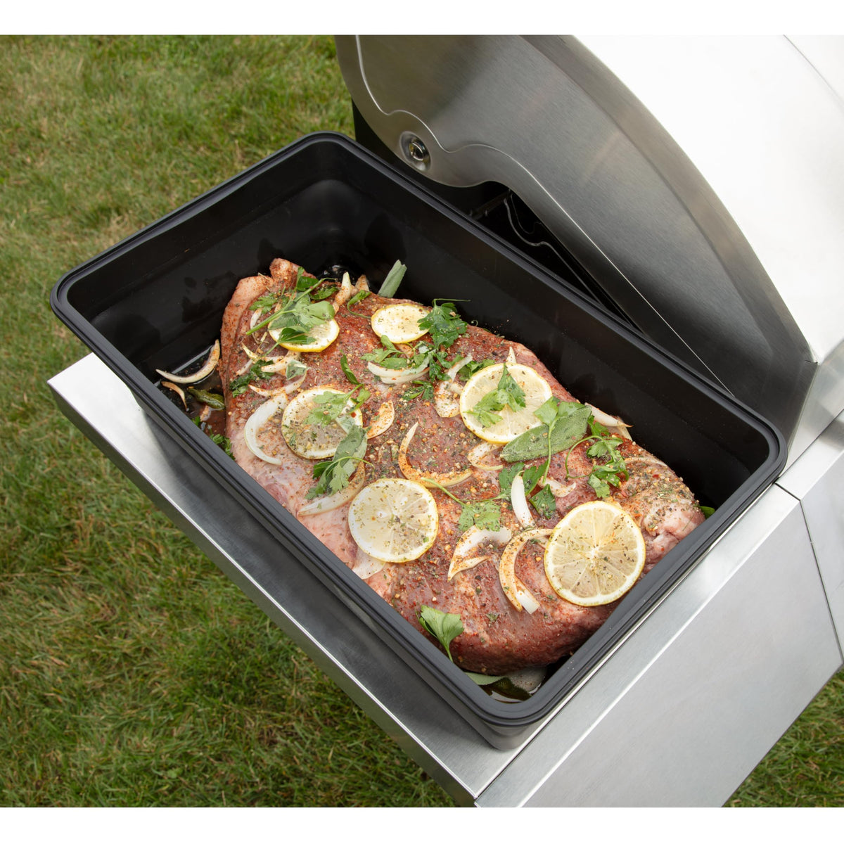 Cuisinart XL Collapsible Marinating Container fits two chickens for marinating.