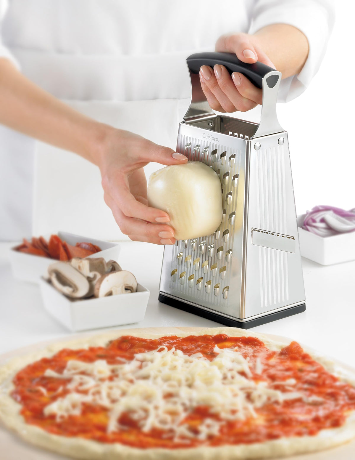 Cuisipro multi-purpose kitchen grater ideal for vegetables and cheese prep.