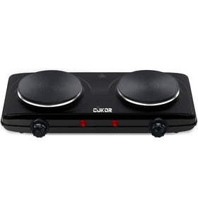 CUKOR double burner compact design on a counter for space-saving cooking.