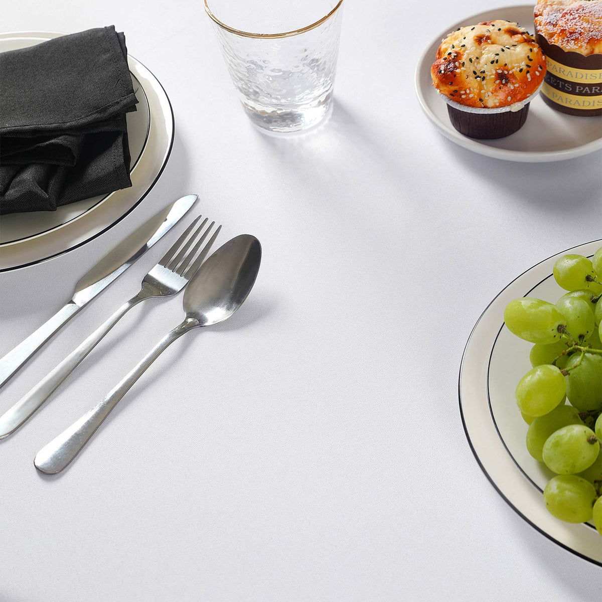 Cupuamon 108-inch white round tablecloth set up for wedding reception