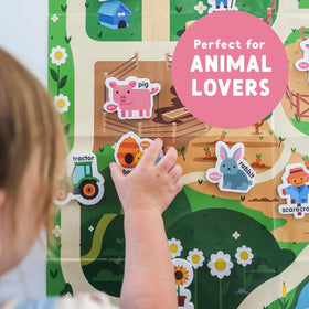 Curious Columbus cow magnet supports recognition and pretend farm play.