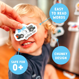 Curious Columbus fridge magnets on the fridge invite interactive learning.