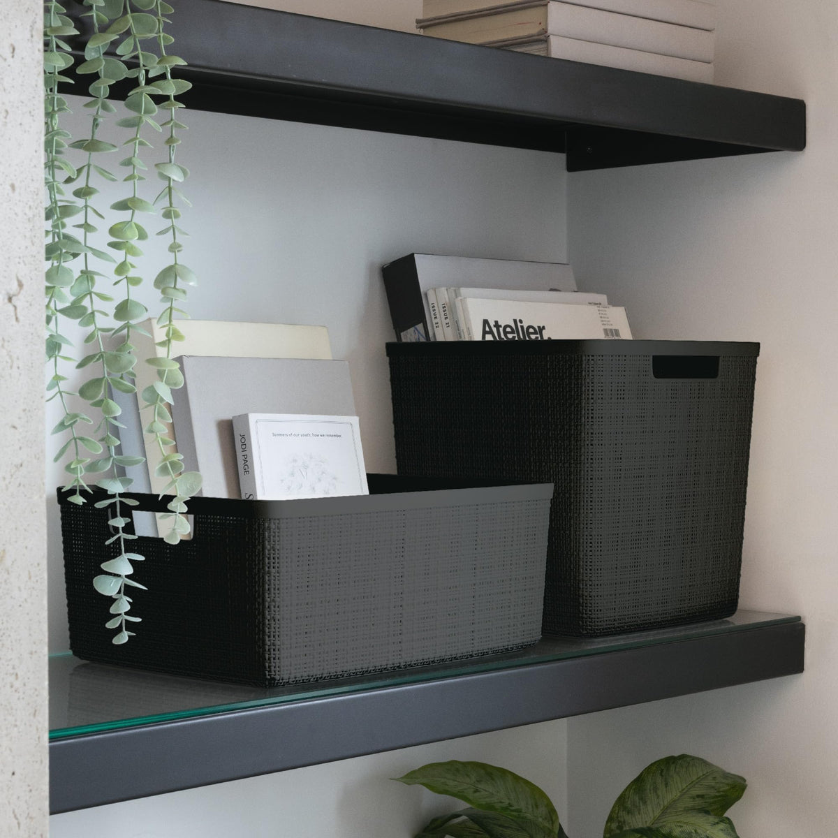 Curver versatile basket complements any décor with a fabric-like look and resin durability.