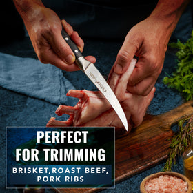 Cutluxe curved boning knife in action slicing meat for trimming