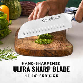 Cutluxe Santoku handle close-up shows ergonomic pakkawood grip.