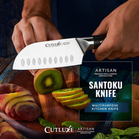 Cutluxe Santoku knife in use chopping vegetables and meat in kitchen