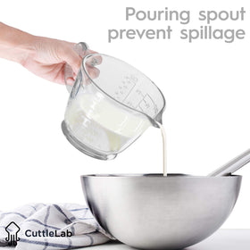 Lemon-lime juicer on top of glass for easy hand squeezing.