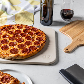 Cuzi Gourmet pizza cutter-scraper for clean slices and quick cleanup.