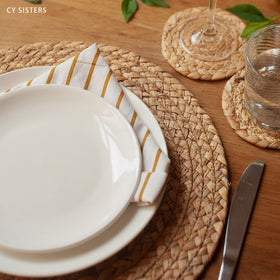 CY SISTERS woven texture close-up highlights durability and natural charm.