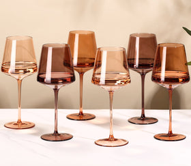 Cyrelwing brown wine glass front view showing hand-blown crystal clarity for autumn dinners.