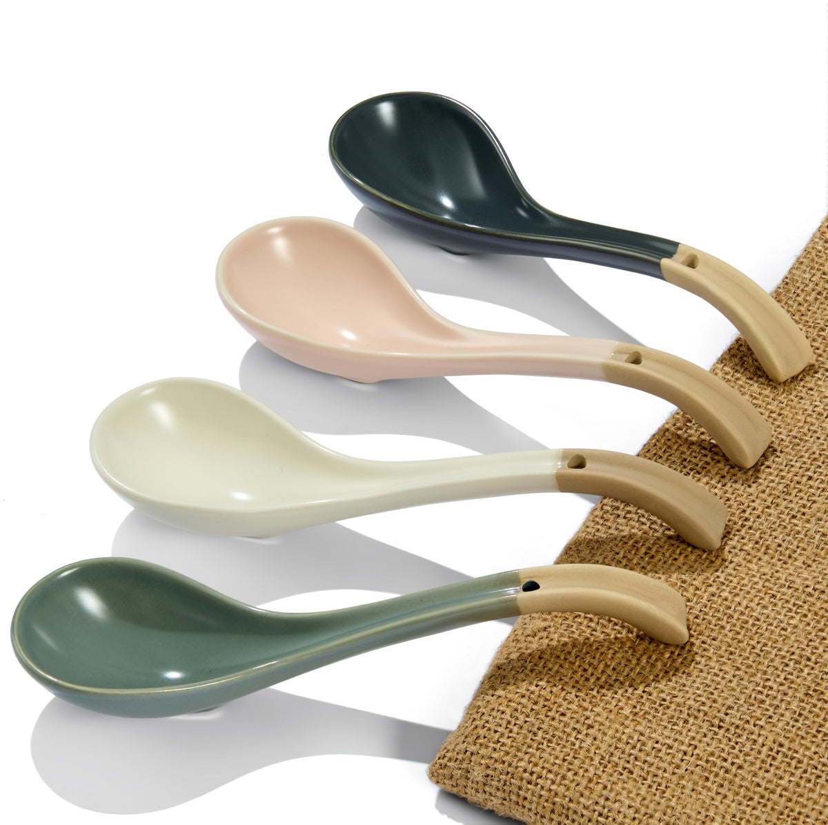 DAHO GOMSU ceramic soup spoon with long handle for easy gripping in ramen bowls.