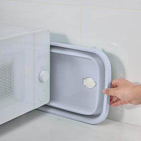 Daimix collapsible dish pans stored neatly in small spaces after use.