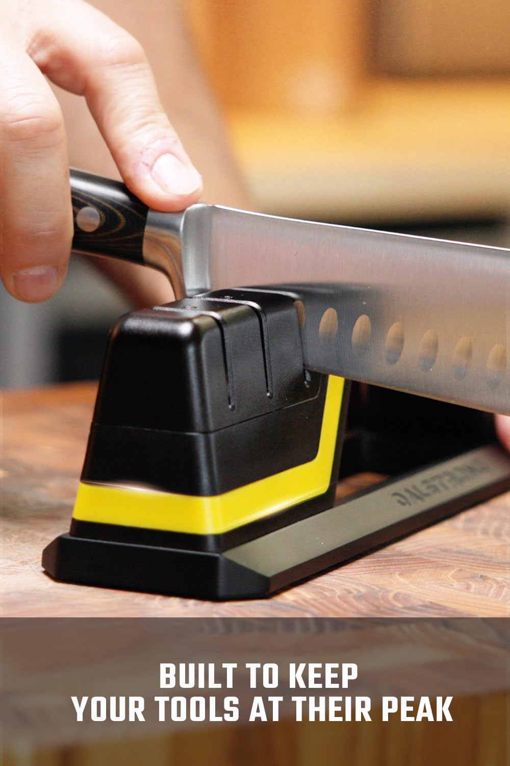 Dalstrong Hornet sharpener water reservoir contains metal particles for cleaner sharpening.