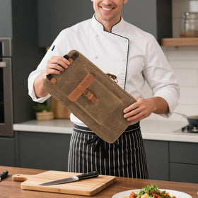 Damero front pocket stores personal items while keeping knives organized