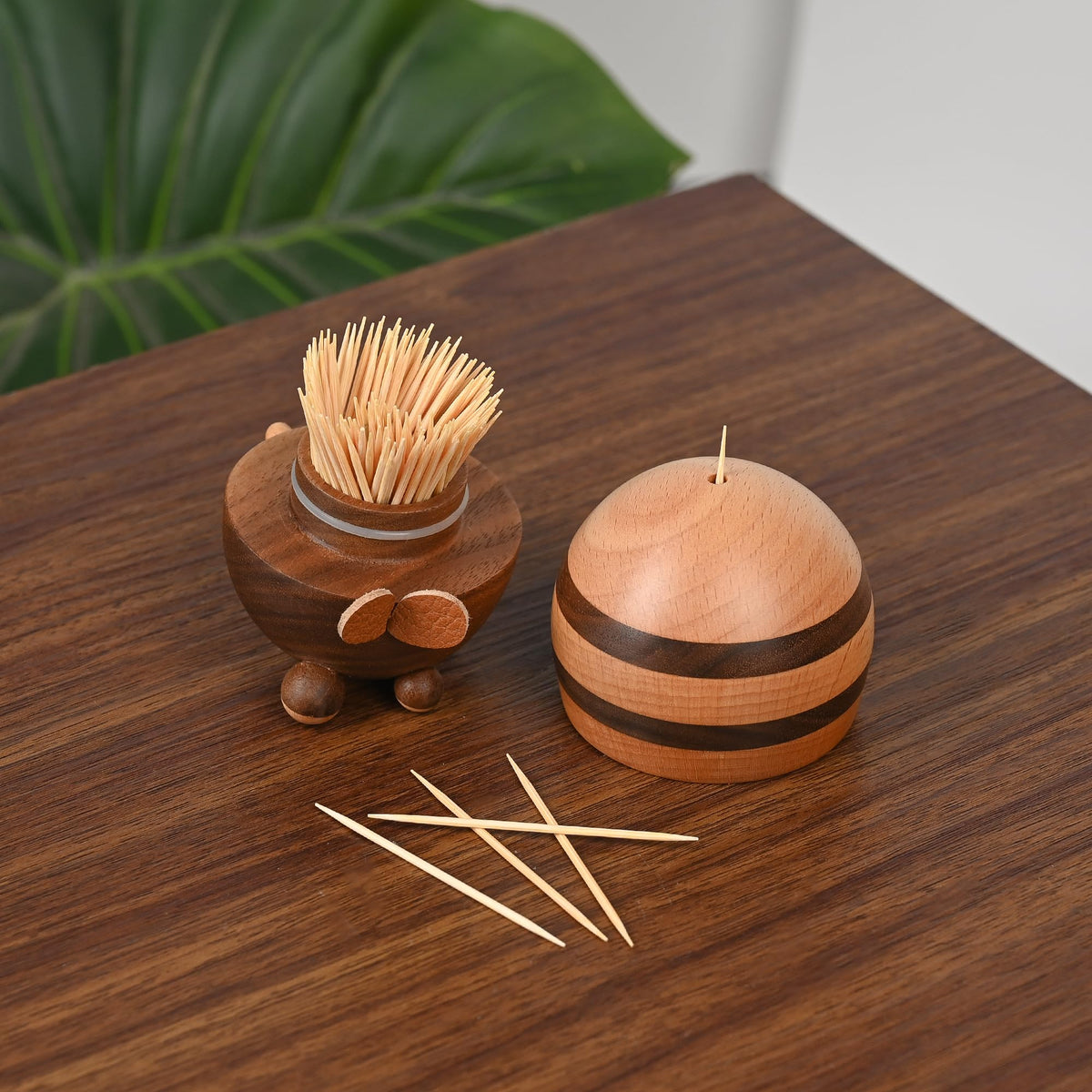 Damuzhi toothpick dispenser highlights walnut grain for premium decor detail.