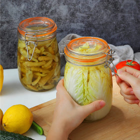 DANALLAN kitchen organization helps declutter countertops with stylish glass jars.