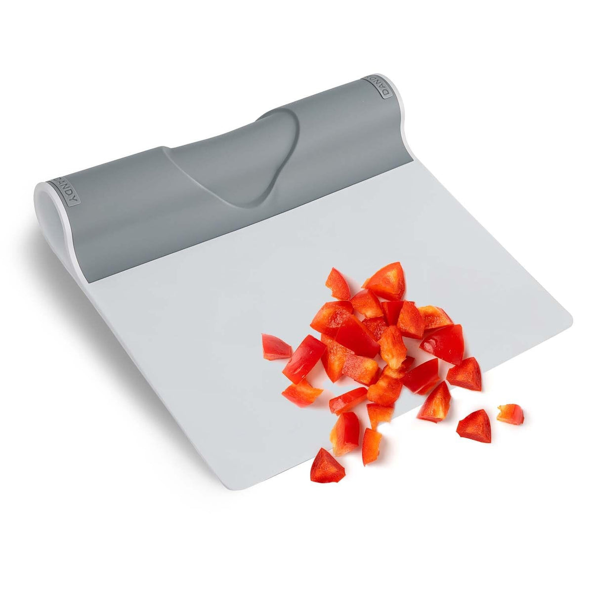 DANDY ScooperDuper folded for precise transfer of chopped ingredients from the cutting board.