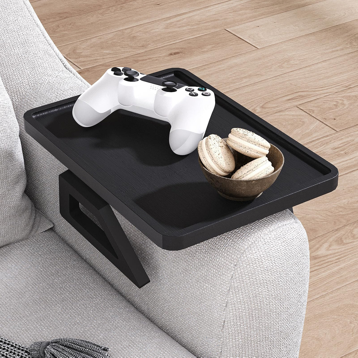 Danfoxer bamboo sofa tray shows sturdy structure for books, remotes, and cups.