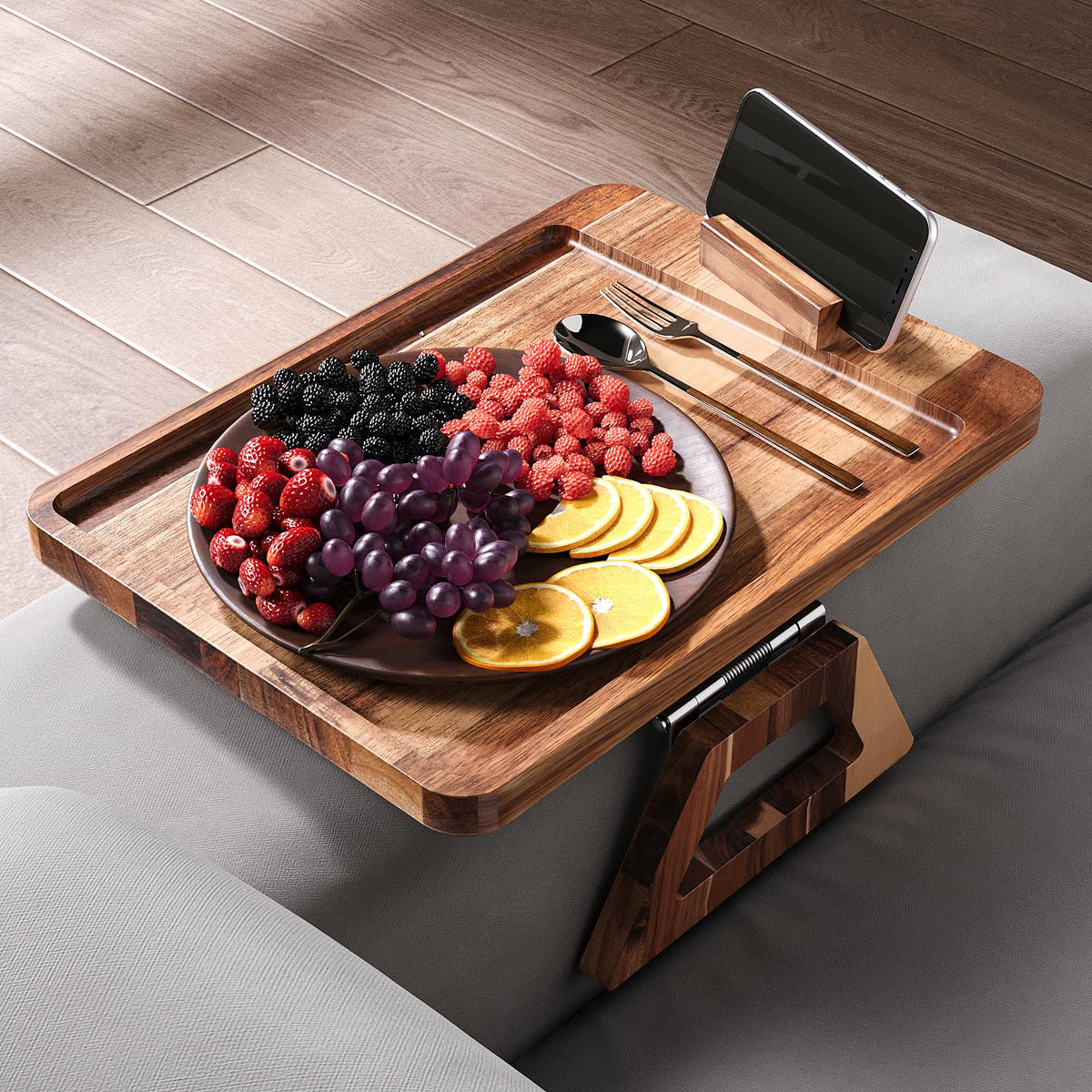 Danfoxer folding sofa arm-rest table keeps essentials within reach.