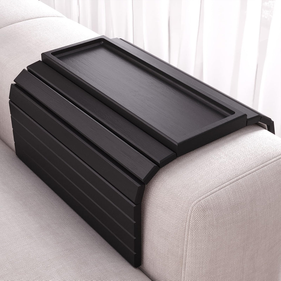 Danfoxer sofa arm tray in bamboo with foldable design for compact storage.