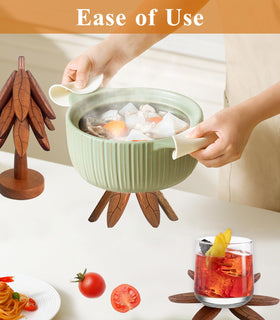 DAOLEMIJI tree-shaped trivets in use protect countertops from hot pots.