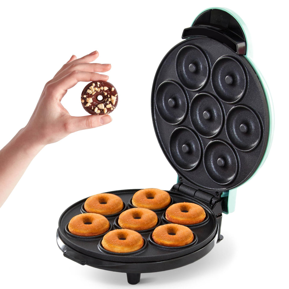 DASH Express Mini Donut Maker on counter, compact design ideal for small spaces.