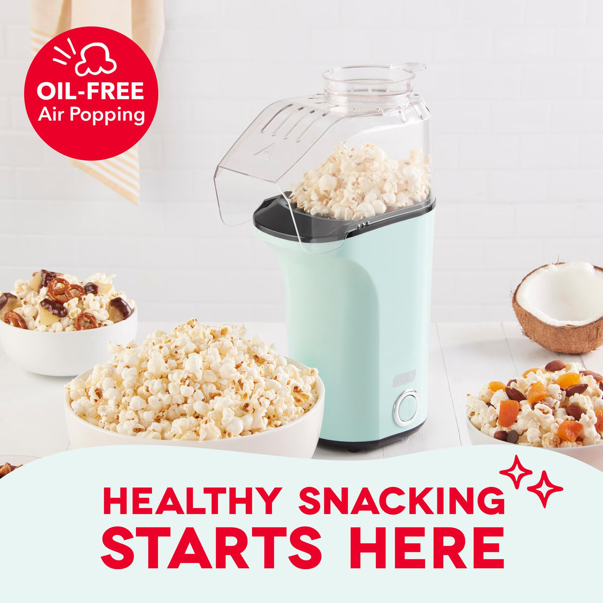 DASH Fresh Pop popcorn maker top view highlighting compact footprint on the counter