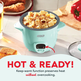 Dash Mini Rice Cooker features cool-touch handles for safe handling during cooking.