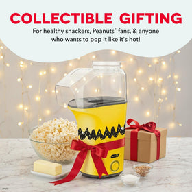 DASH Peanuts Fresh Pop popcorn maker packaging and contents ready to go.