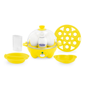 DASH Rapid Egg Cooker boiling seven eggs on a compact counter, quick breakfast idea