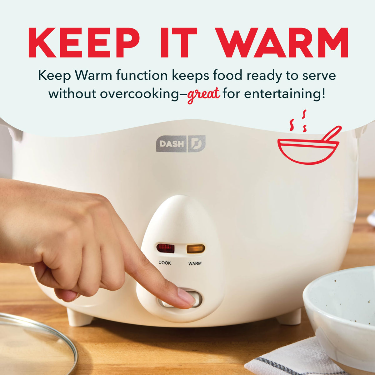 DASH rice paddle and measuring cup included for precise prep and cooking.