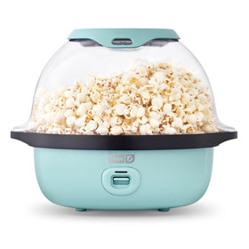 Dash SmartStore Deluxe stirring popcorn maker front view showing theater-style popcorn.
