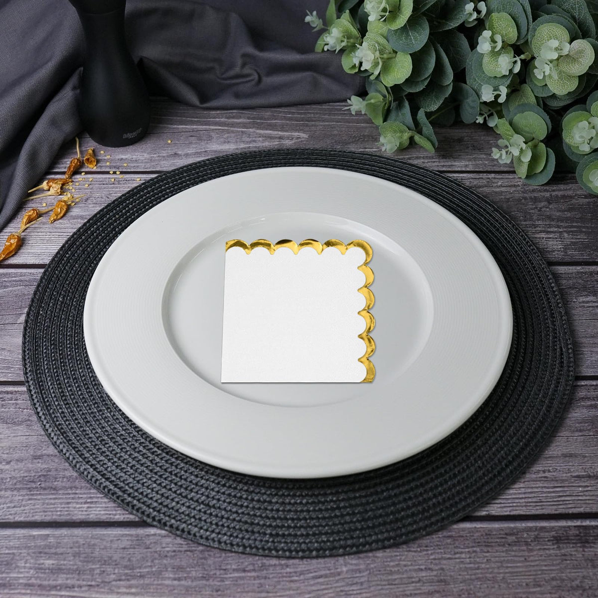 Close-up of Datyiiha napkin edge with gold foil trim.
