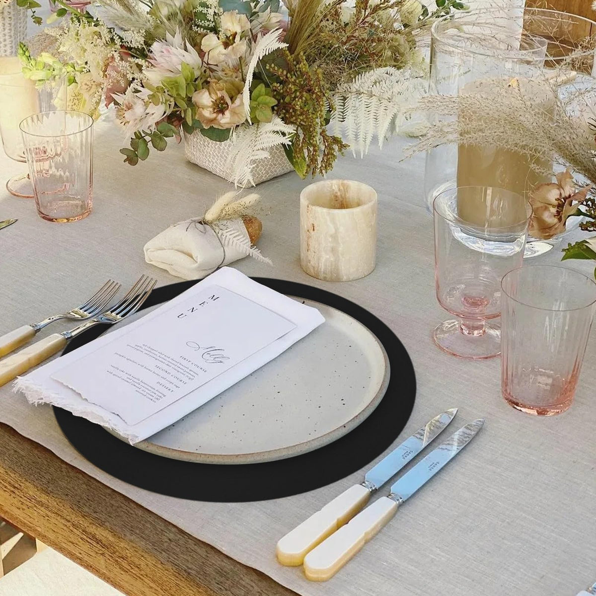Datyiiha 14-inch round placemats suit standard dining tables and events.