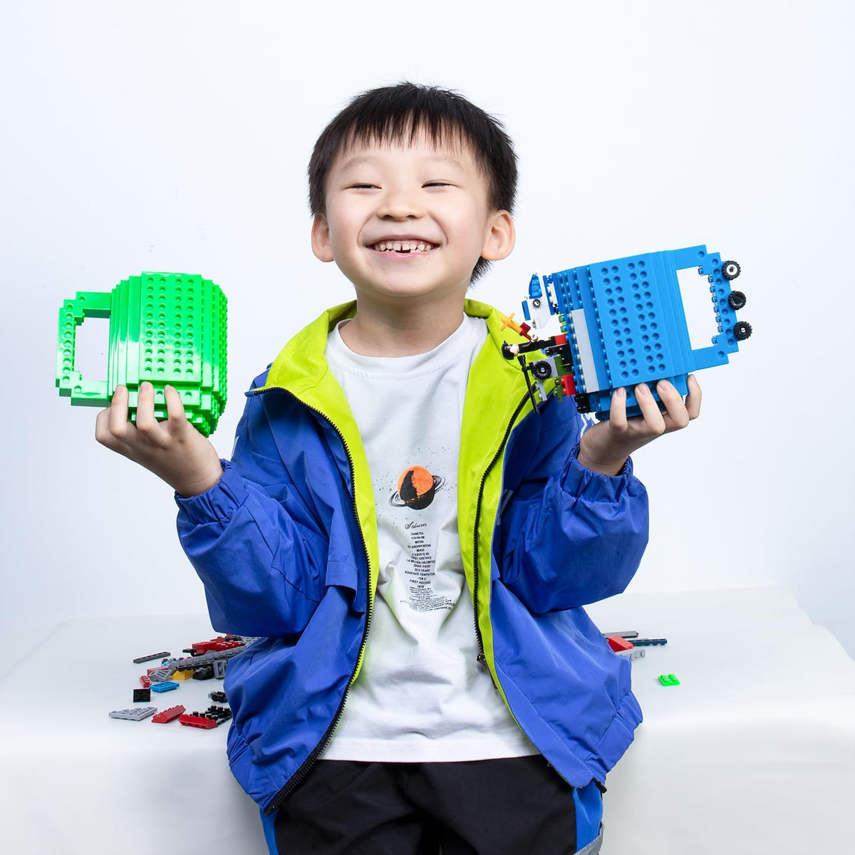 DAYMOO Build-on Brick Mug suitable for kids and adults to sip while building.