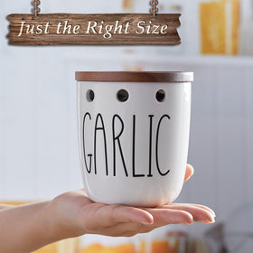DAYYET Garlic Keeper wooden lid protecting garlic from light to extend freshness.