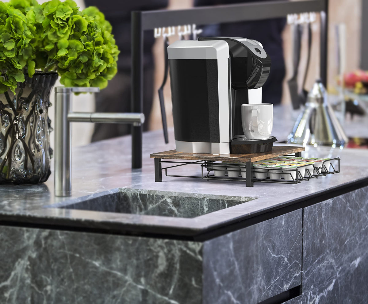 Deco Brothers K-Cup drawer under-machine demonstrates efficient counter organization.