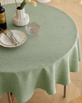 Decorelia tablecloth close-up shows rustic linen texture and durability.