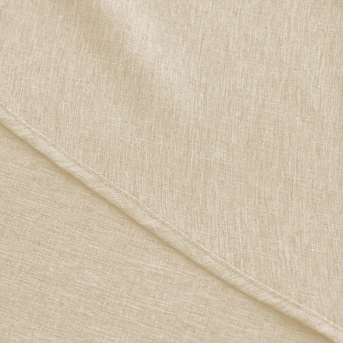 Decorelia tablecloth on indoor-outdoor dining setup during a family gathering.